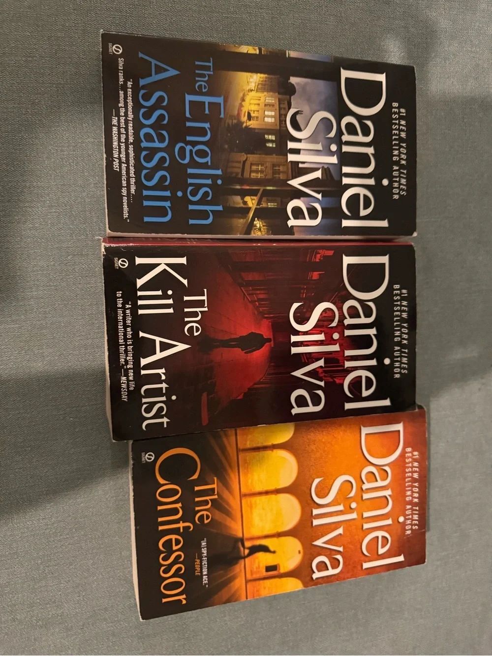 Daniel Silva Paperback Book Set - Blue, Red, Orange Covers